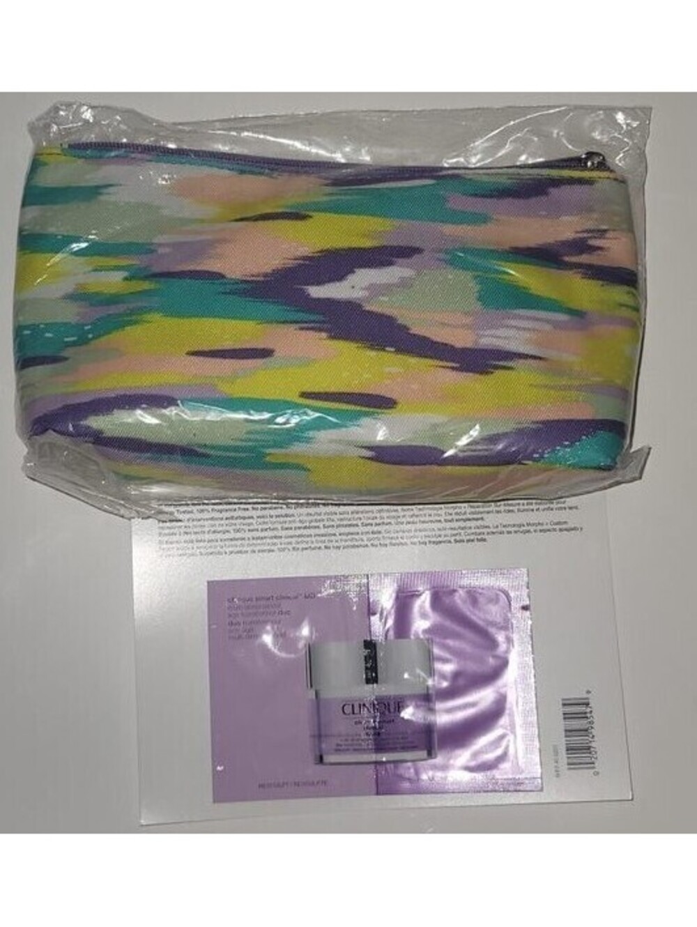 CLINIQUE COLORFUL COSMETIC BAG WITH FREE FACE LOTION SAMPLE